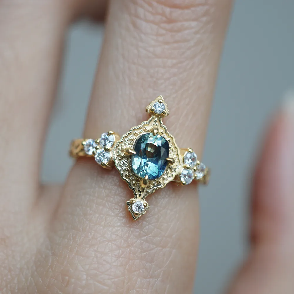 One Of A Kind: Arabasque Bi-Color Sapphire Ring in 14K and 18K Gold