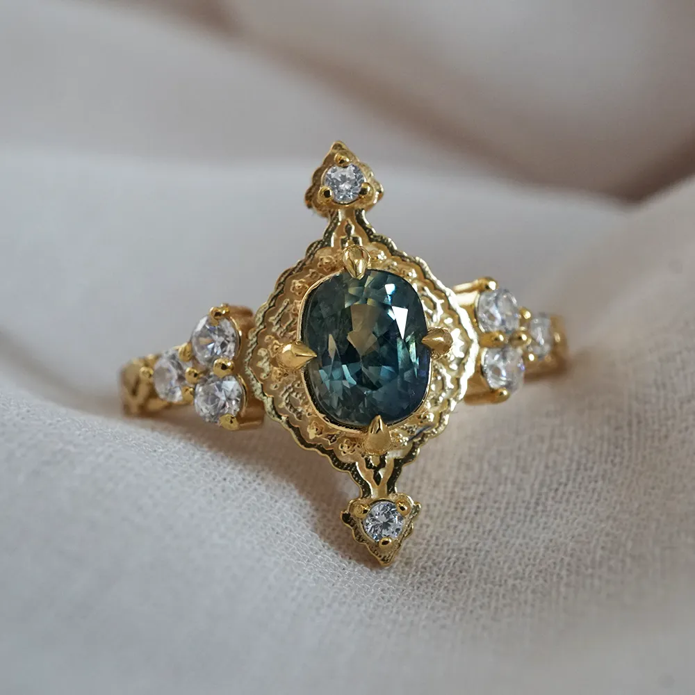 One Of A Kind: Arabasque Bi-Color Sapphire Ring in 14K and 18K Gold